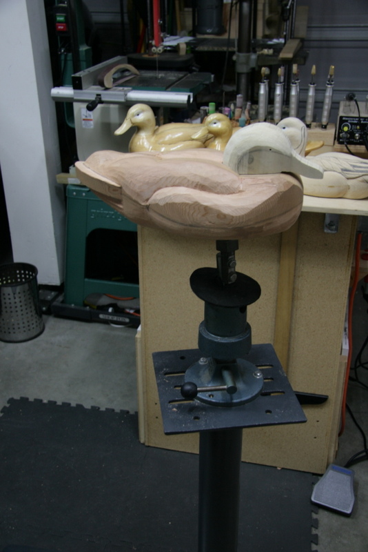 Low-head mallard carved from red cedar